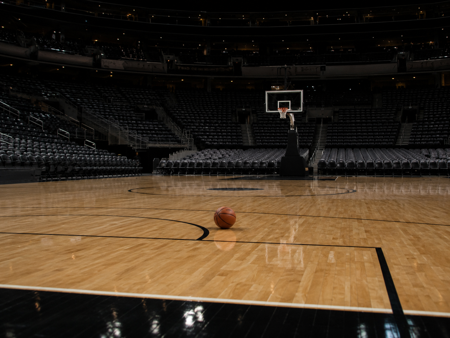 An empty basketball court after a playoff game.