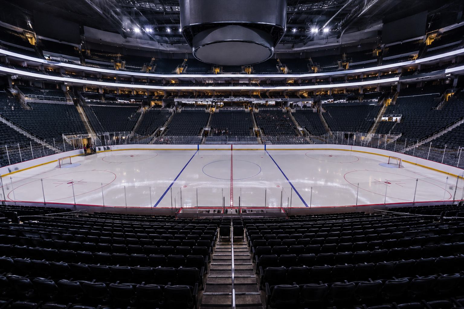 An empty hockey arena is prepared before a championship game.