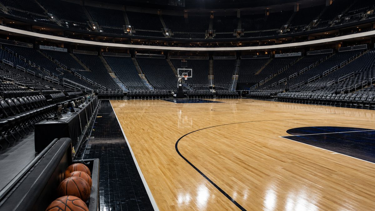 Empty professional basketball arena before a championship game.