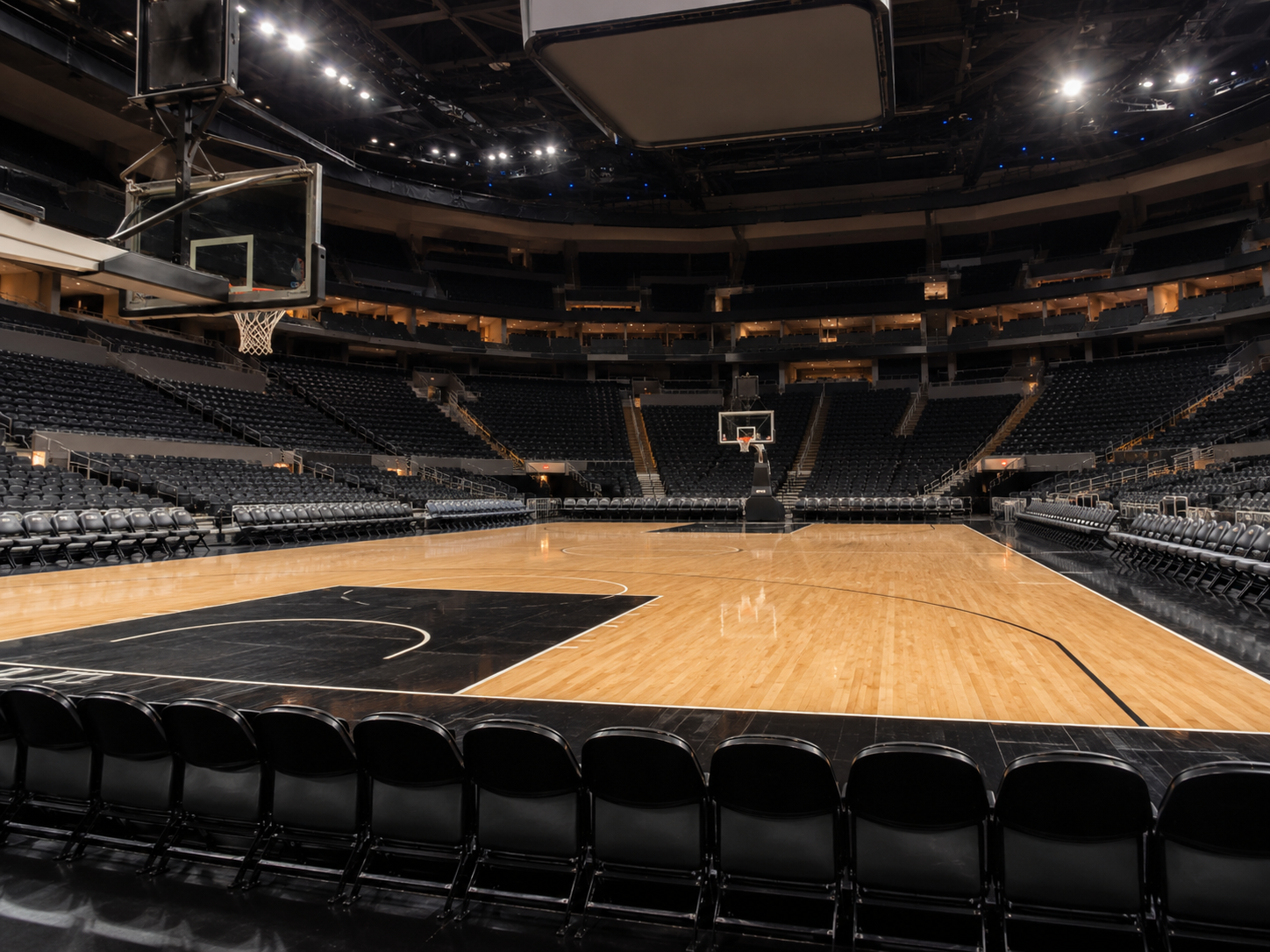 Empty basketball arena prepared for a championship game.
