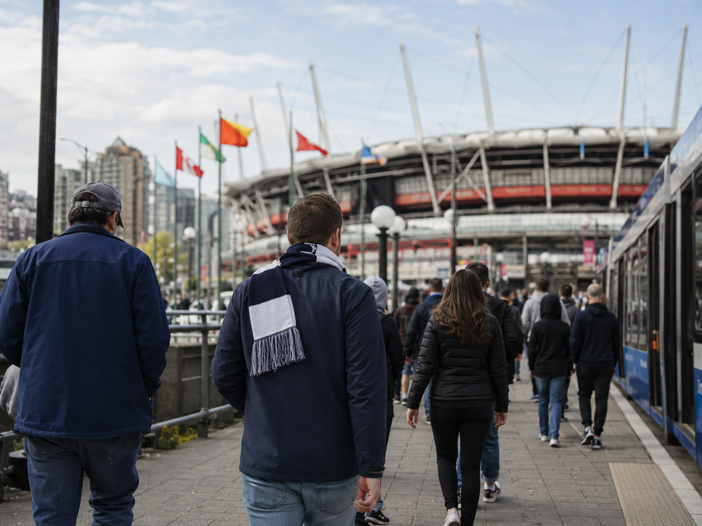 Fans walking toward a stadium for an international football game.