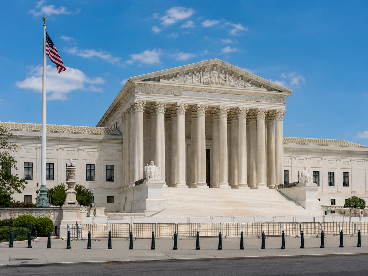 The exterior of the United States Supreme Court building at dusk.